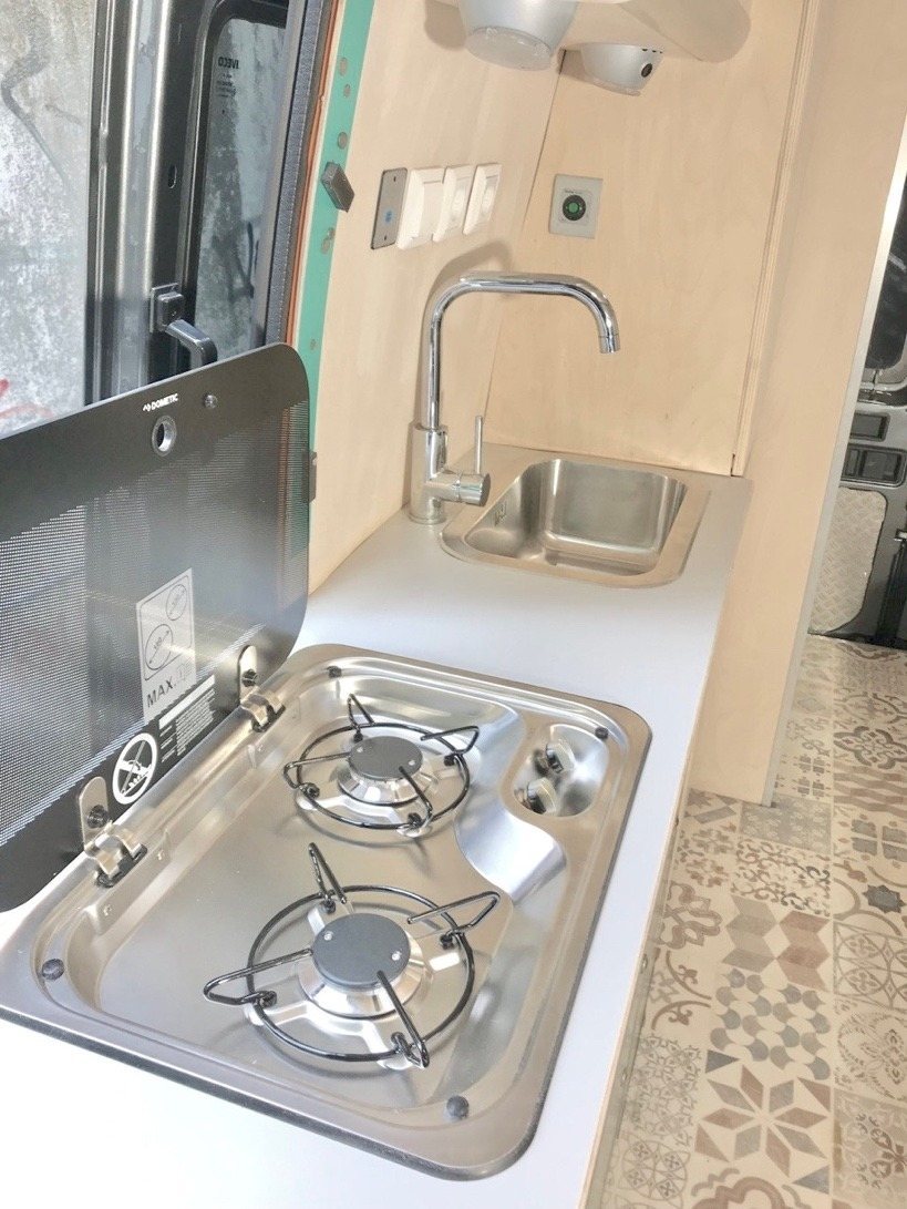 Kitchen with gas hob and sink